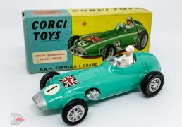 Corgi No.152S BRM Formula 1 Grand Prix Racing Car - turquoise body & base with silver nose and exhaust, racing number 1 and Union Jack nose decals, silver interior with driver figure, flat spun hubs which have had accessory pack adhesive spoked hubs applied - Near mint aside from a small touch in on rear of body and in generally good plus blue and yellow box.