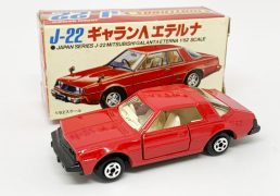 Matchbox Superfast Japan Series J-22 Mitsubishi Galant Eterna - red body, clear windows, ivory interior, gloss black Japan base, small diameter 5-spoke wheels - Mint in Excellent but a little colour picture box.
