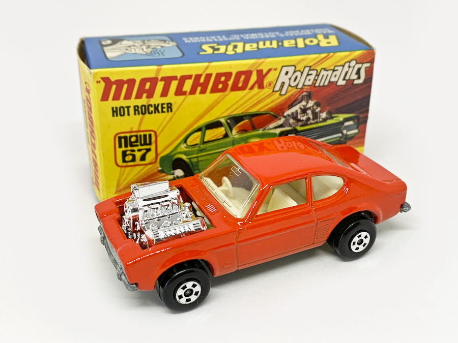 Matchbox Superfast 67c Ford Capri Hot Rocker Dragster (Superfast 67b) - burnt orange body, clear windows, ivory interior, bare metal base, 5-spoke wide wheels - Mint in Near Mint "New" type I box. Nice example.