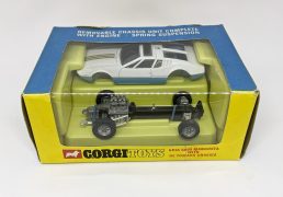 Corgi 271 Ghia 5000 Mangusta with De Tomaso Chassis - finished in two-tone white, blue, black interior with graphite grey detachable chassis and cast hubs (roof aerial is broken) otherwise Mint including plastic inner tray, outer blue and yellow window box is Good Plus (cellophane has been professionally replaced, repaired tear under window).
