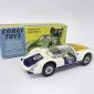 Corgi 330 Porsche Carrera 6 - RARE EXPORT ISSUE - white body, dark blue doors, bonnet and engine cover, black interior with figure driver, cast hubs, racing number 60 - overall condition is very near mint in a generally Excellent plus blue and yellow carded picture box.