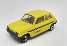 Matchbox Superfast No.21c Renault 5 TL - clear windows, dot-dash wheels, yellow body with black "Le Car" tampo print, tan interior, satin black base. Very near mint, unboxed.
