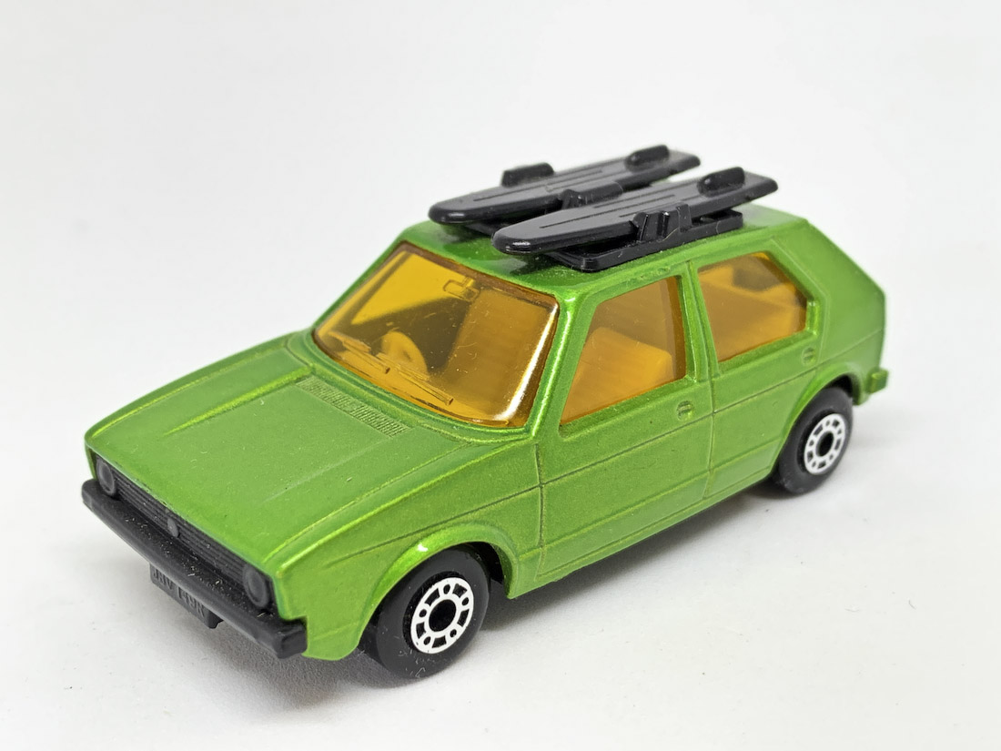 Matchbox Superfast No.7 Volkswagen Golf amber windows, dark yellow interior, matt black base, metallic emerald green body - Mint, unboxed.