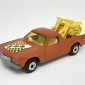 Matchbox Superfast 60d Holden Pick-up Truck (Superfast 60c) - red body with racing number 500 hood label, light amber windows, pale yellow interior, dark yellow Motorcycles with racing numbers 9 & 12, bare metal base with 